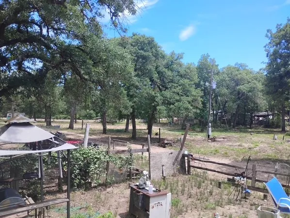 $325,000 | 647 Hidden Oaks Drive, Elgin, TX 78621