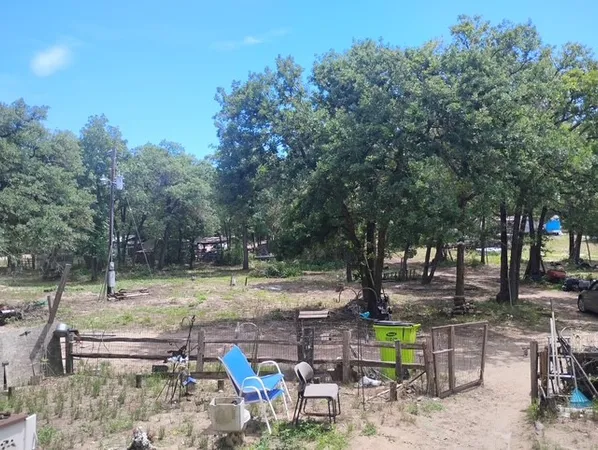 $325,000 | 647 Hidden Oaks Drive, Elgin, TX 78621