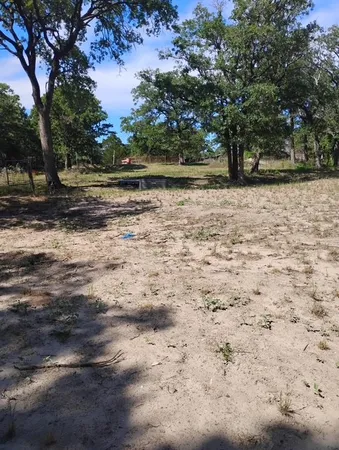 $325,000 | 647 Hidden Oaks Drive, Elgin, TX 78621