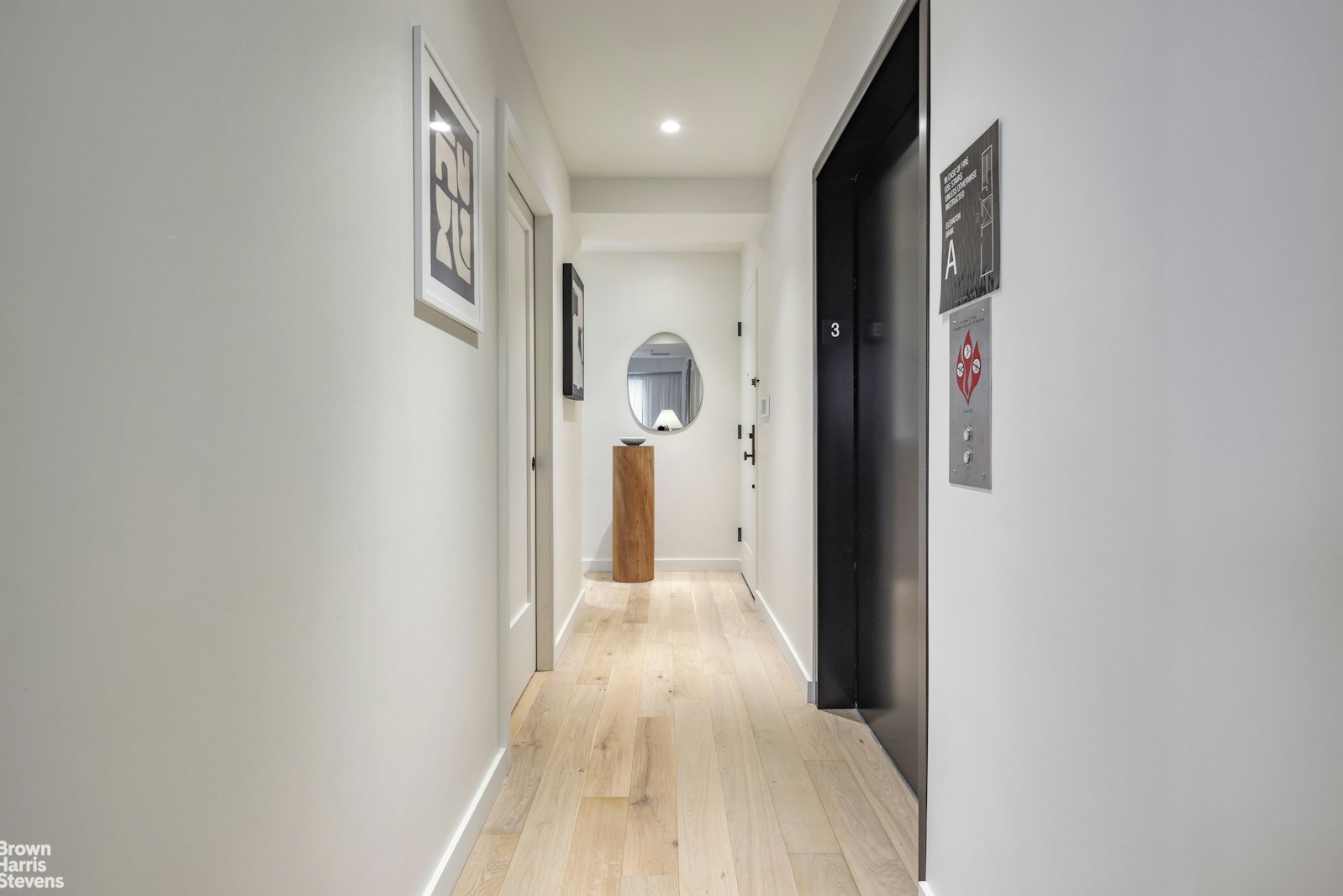 353 20th Street, Unit PH Brooklyn, NY 11215 - Photo 11 of 12 a view of a hallway with wooden floor