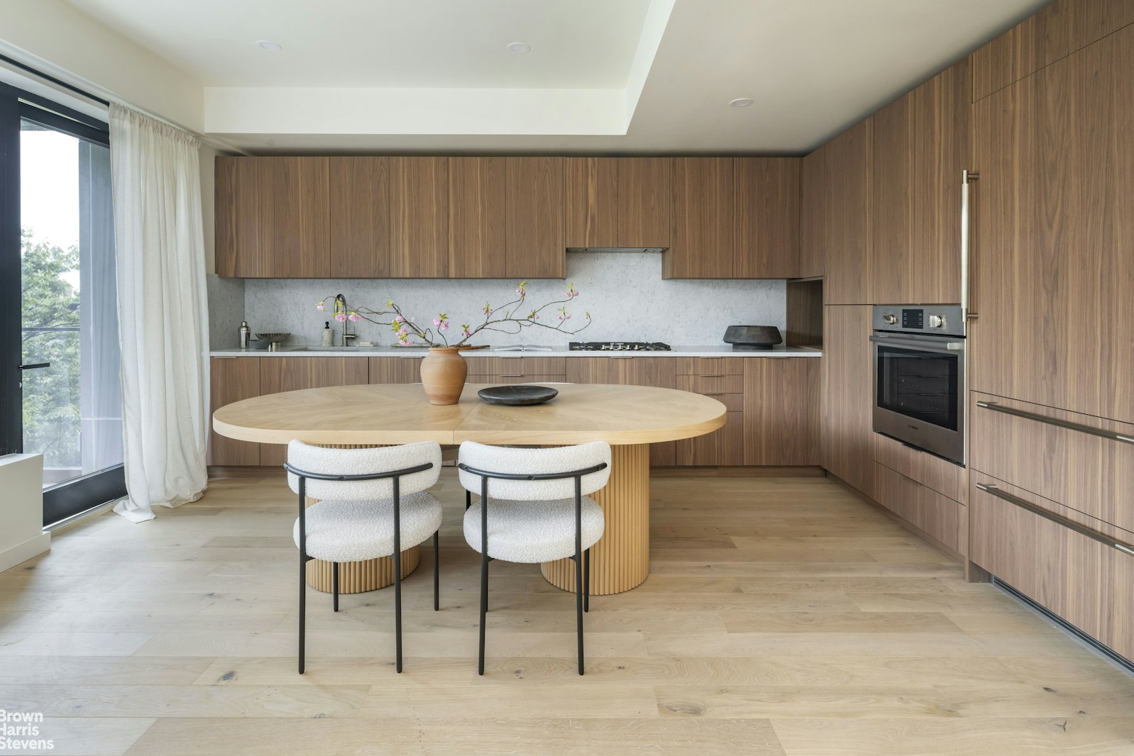 353 20th Street, Unit PH Brooklyn, NY 11215 - Photo 4 of 12 a kitchen with a sink cabinets and window