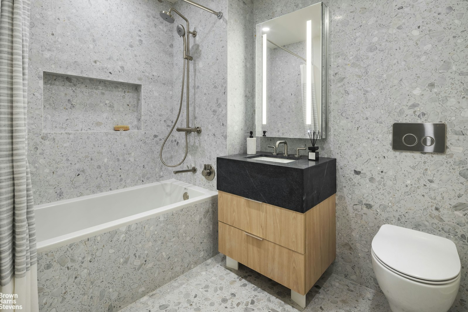 353 20th Street, Unit PH Brooklyn, NY 11215 - Photo 10 of 12 a bathroom with a tub a sink and a toilet