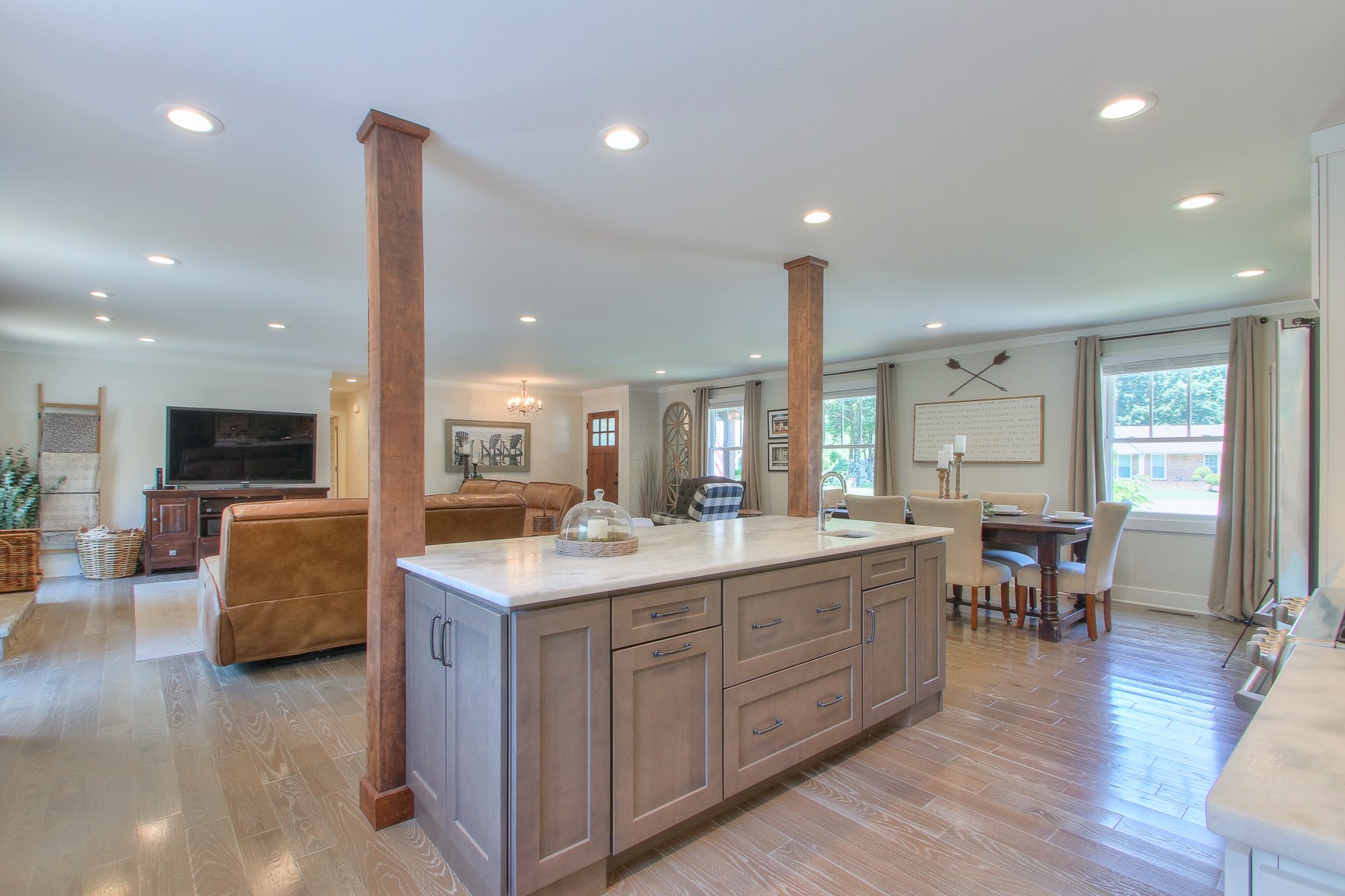 183 Lancaster Drive Franklin, TN 37064 - Photo 11 of 50 a room with stainless steel appliances granite countertop furniture wooden floor a sink and a window