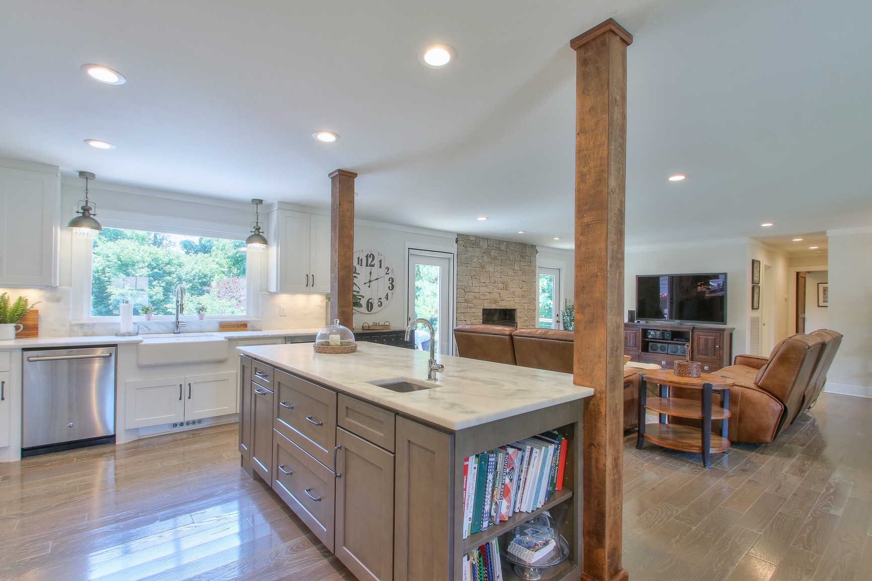 183 Lancaster Drive Franklin, TN 37064 - Photo 12 of 50 a kitchen with stainless steel appliances granite countertop sink wooden cabinets and dining table