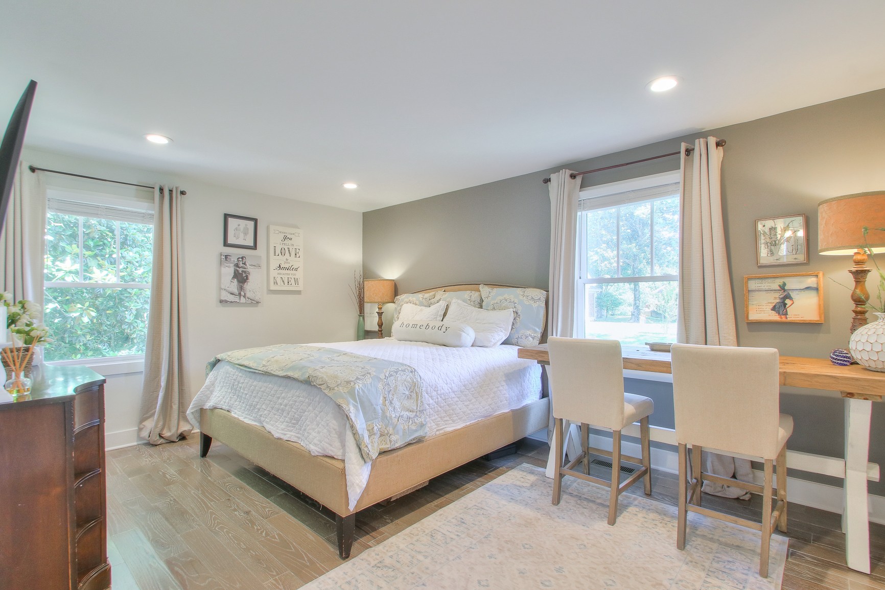 183 Lancaster Drive Franklin, TN 37064 - Photo 21 of 50 a bedroom with a large bed and a table