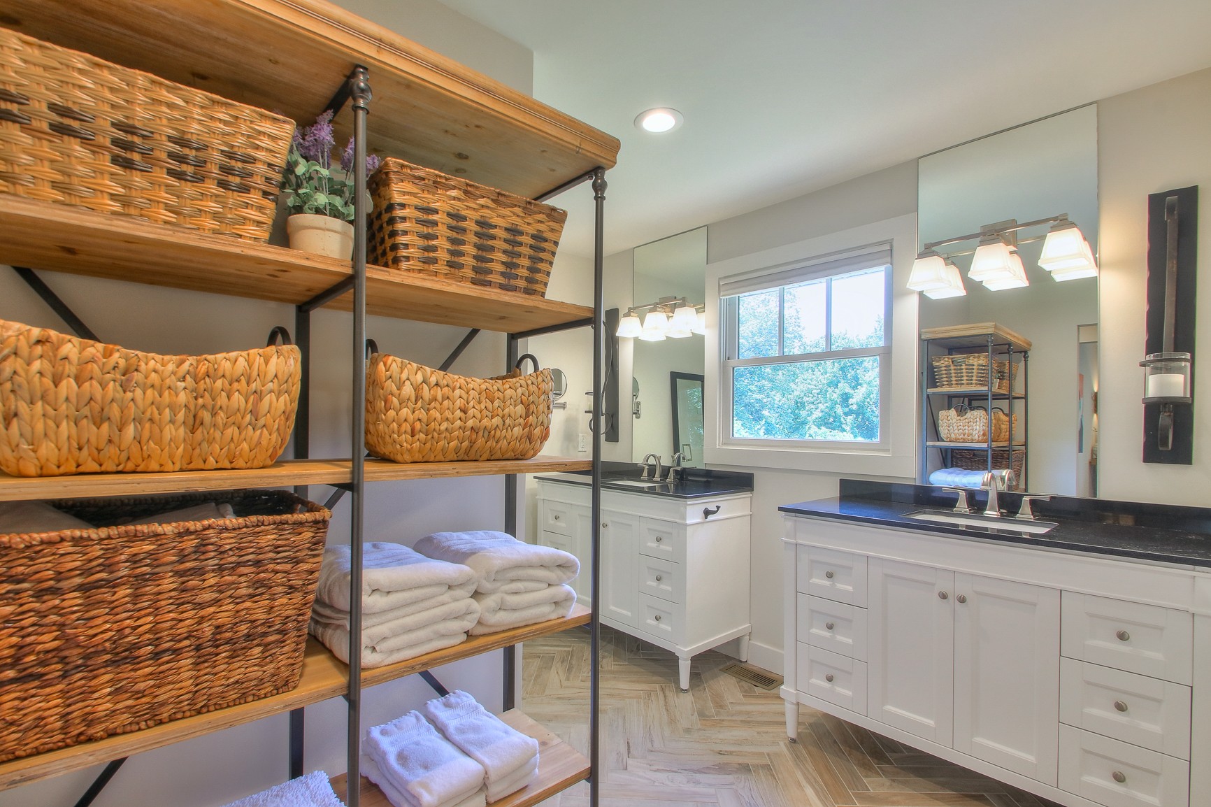 183 Lancaster Drive Franklin, TN 37064 - Photo 26 of 50 a kitchen with stainless steel appliances kitchen island granite countertop a stove a sink and white cabinets with wooden floor
