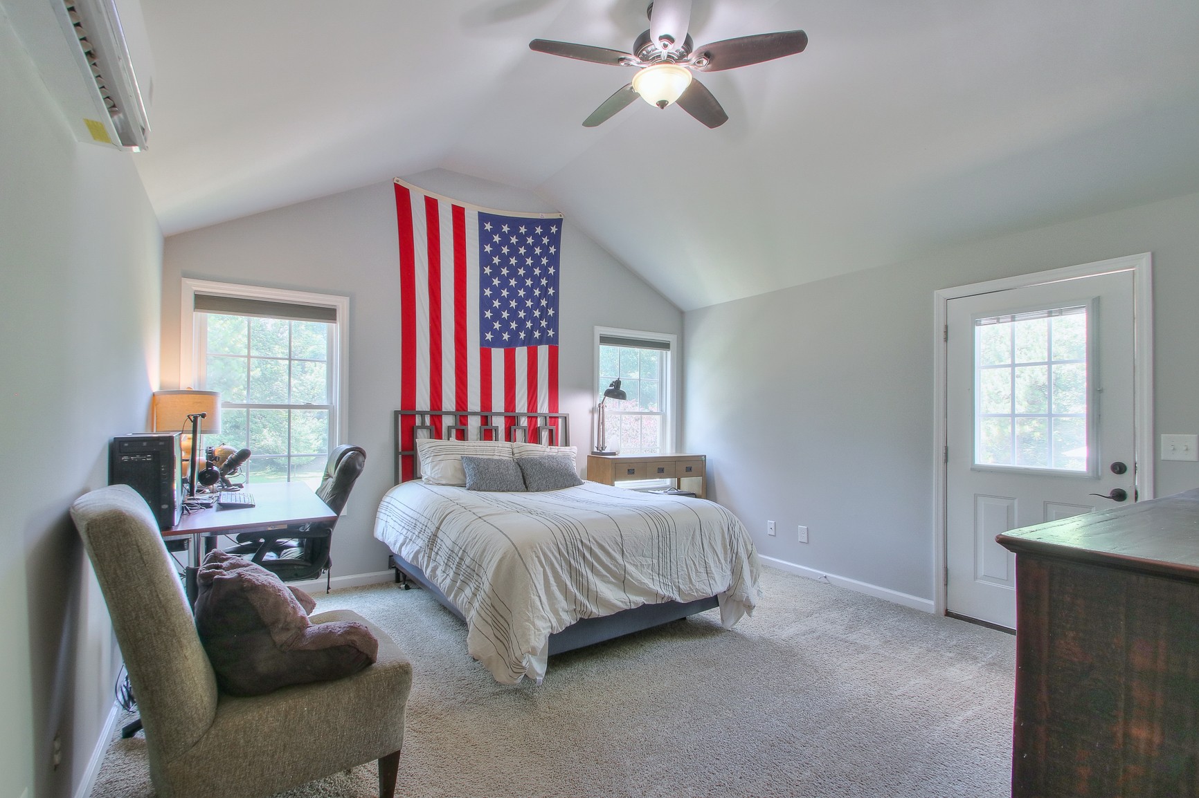 183 Lancaster Drive Franklin, TN 37064 - Photo 29 of 50 a bedroom with a bed couches and windows