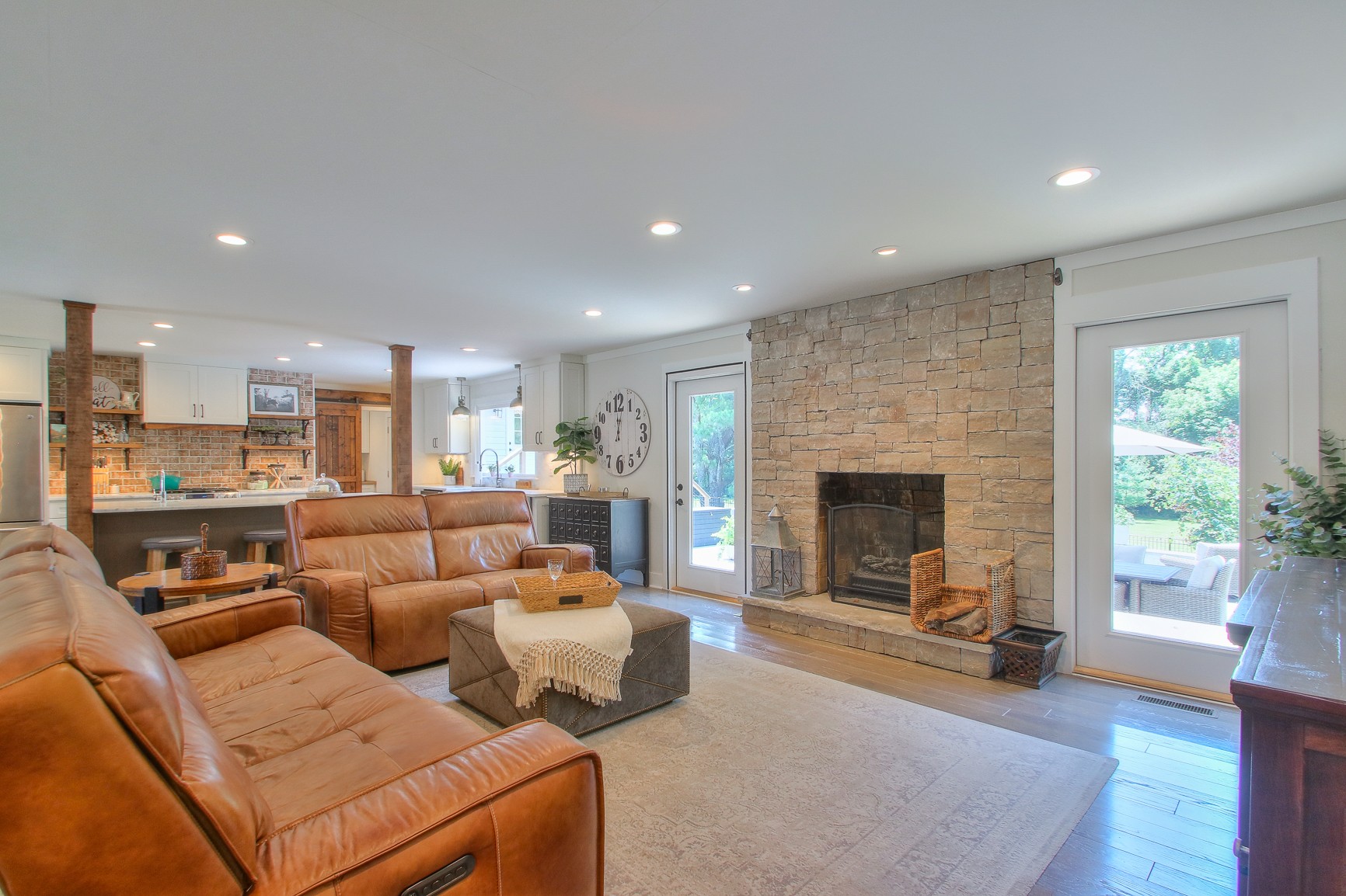 183 Lancaster Drive Franklin, TN 37064 - Photo 5 of 50 a living room with furniture and a fireplace