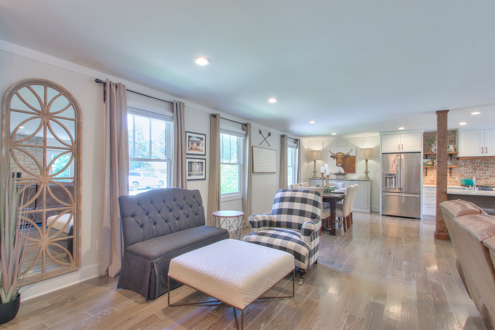 183 Lancaster Drive Franklin, TN 37064 - Photo 8 of 50 a living room with furniture and a large window
