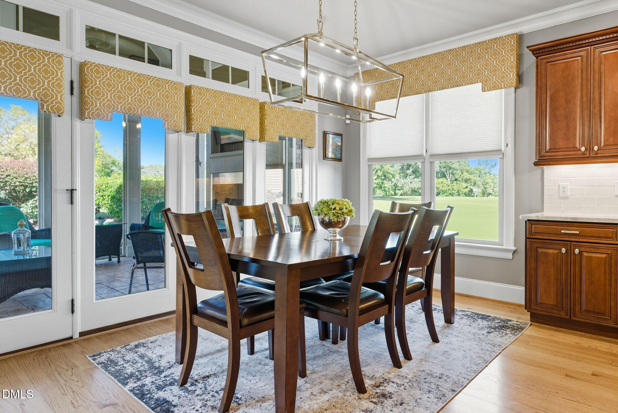 2603 Peachleaf Street Raleigh, NC 27614 - Photo 30 of 90 a view of a dining room with furniture window and wooden floor