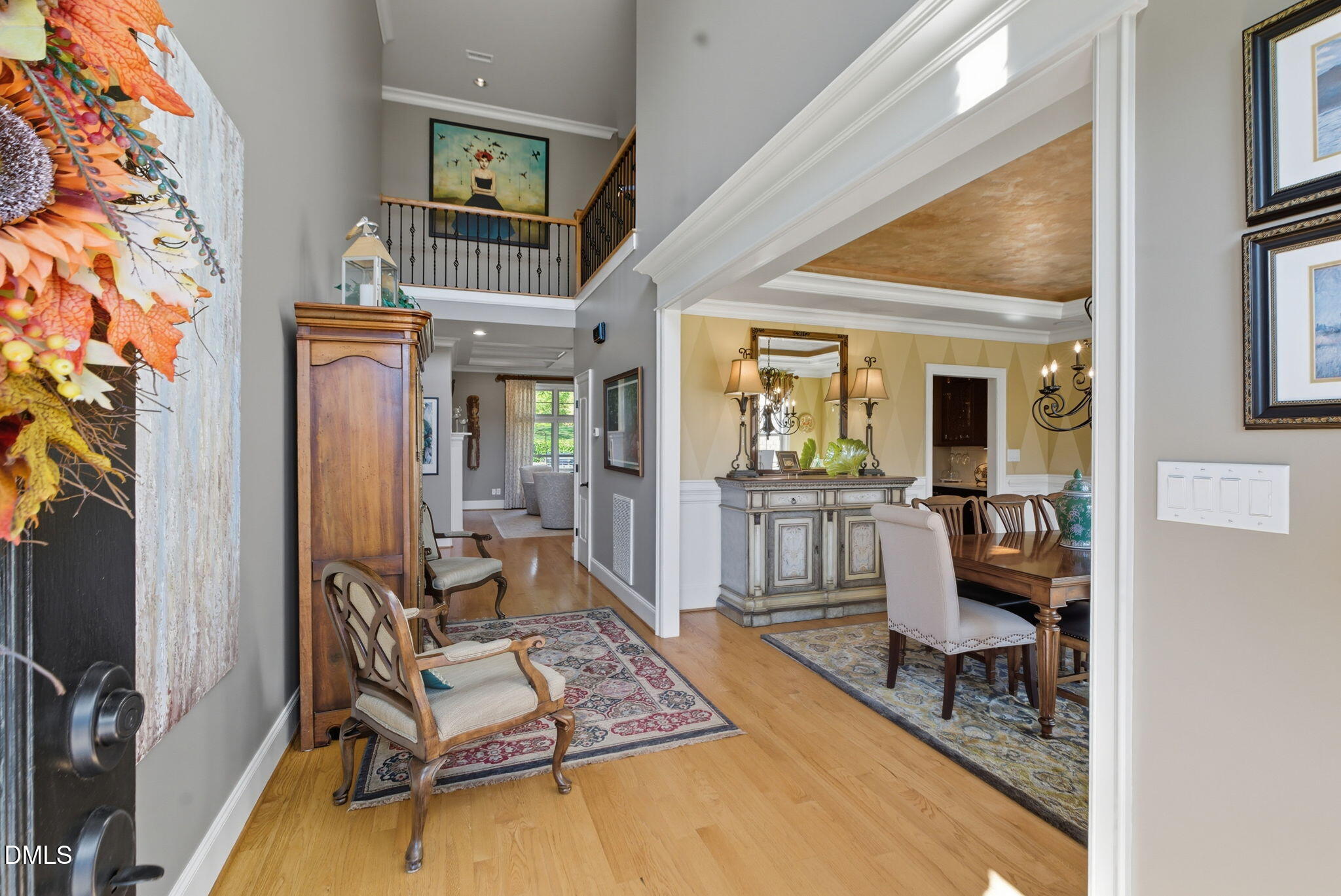2603 Peachleaf Street Raleigh, NC 27614 - Photo 4 of 90 a living room with furniture a rug and a flat screen tv