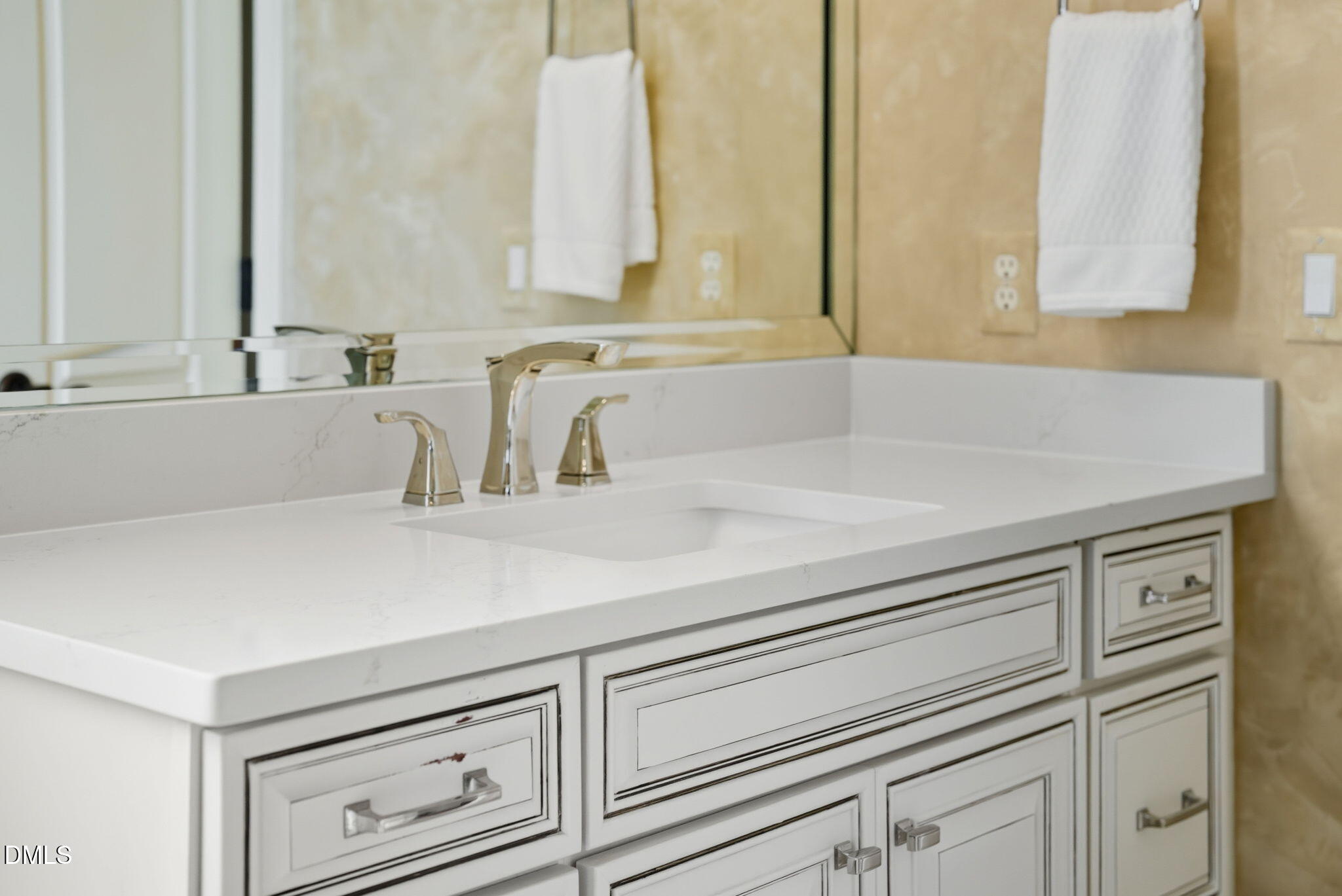 2603 Peachleaf Street Raleigh, NC 27614 - Photo 50 of 90 a bathroom with a sink and a mirror