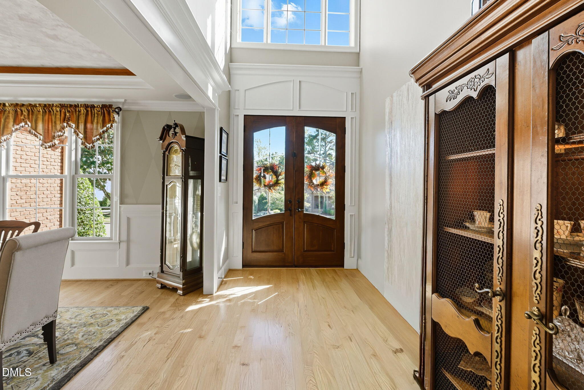 2603 Peachleaf Street Raleigh, NC 27614 - Photo 5 of 90 a view of an entryway with wooden floor and a livingroom