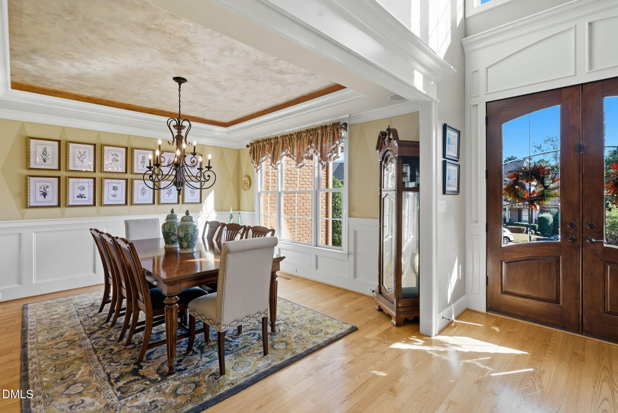 2603 Peachleaf Street Raleigh, NC 27614 - Photo 6 of 90 a dining room with furniture a chandelier and window