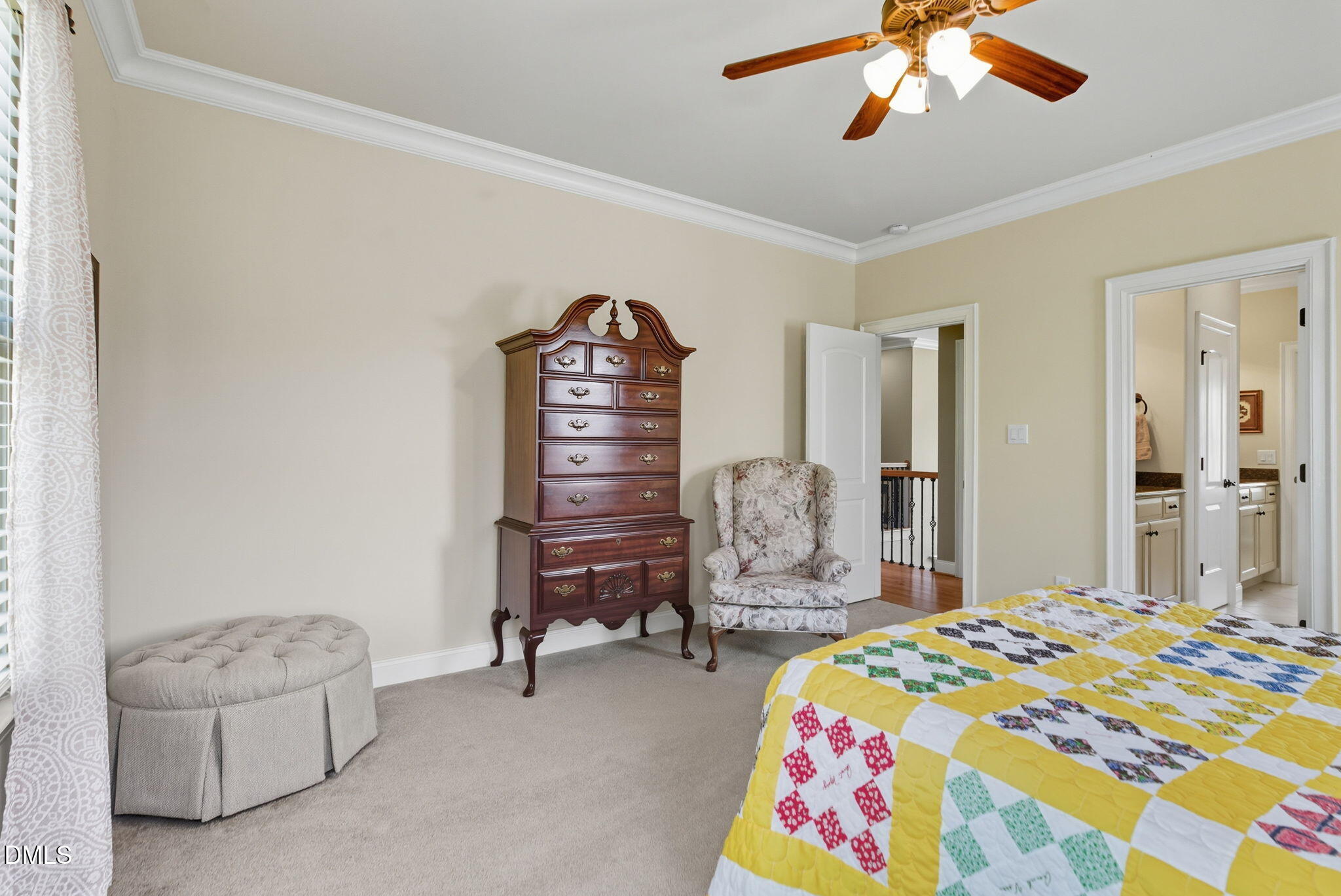 2603 Peachleaf Street Raleigh, NC 27614 - Photo 71 of 90 a bedroom with a bed and a chandelier