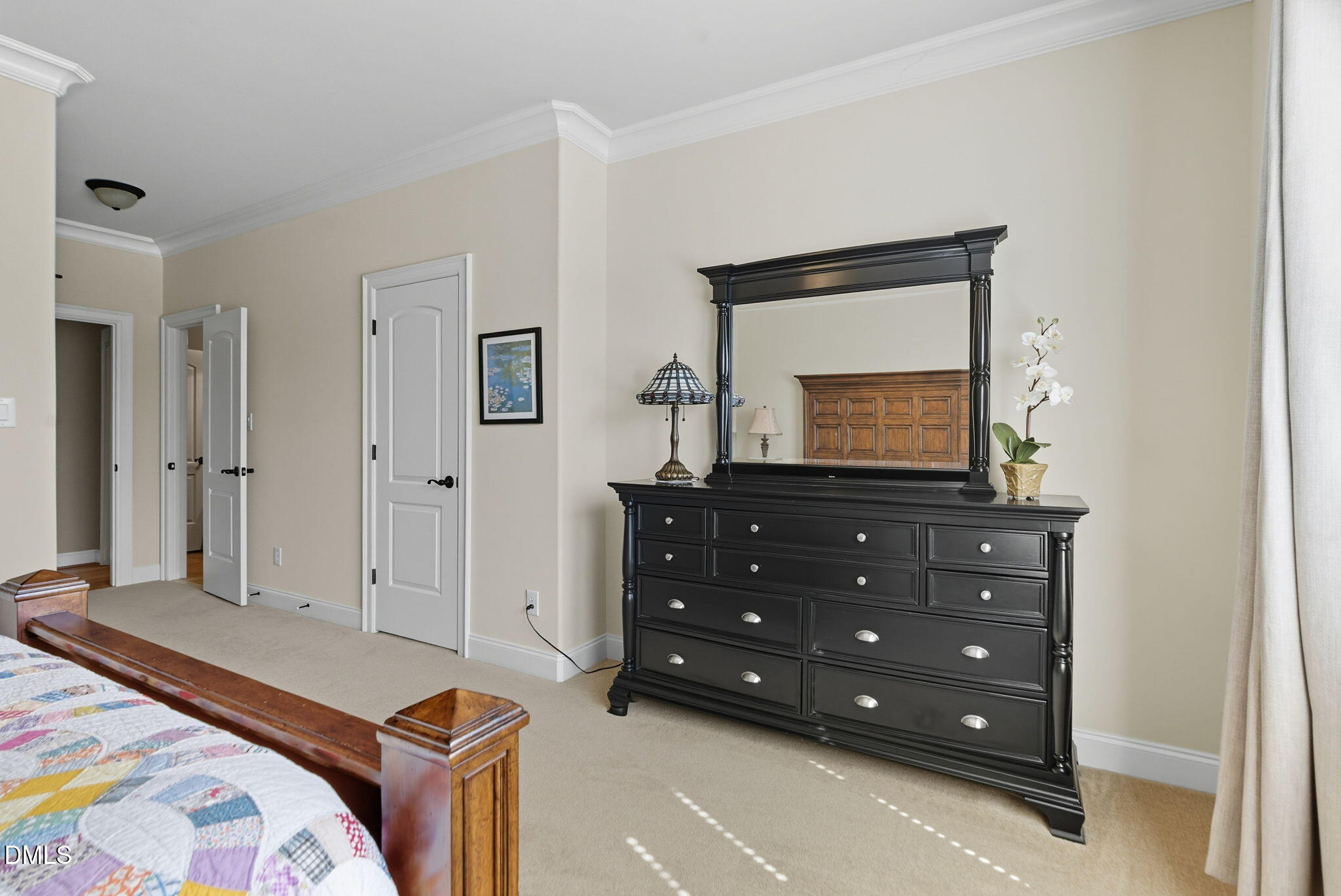 2603 Peachleaf Street Raleigh, NC 27614 - Photo 74 of 90 a bedroom with a bed and a mirror on dresser