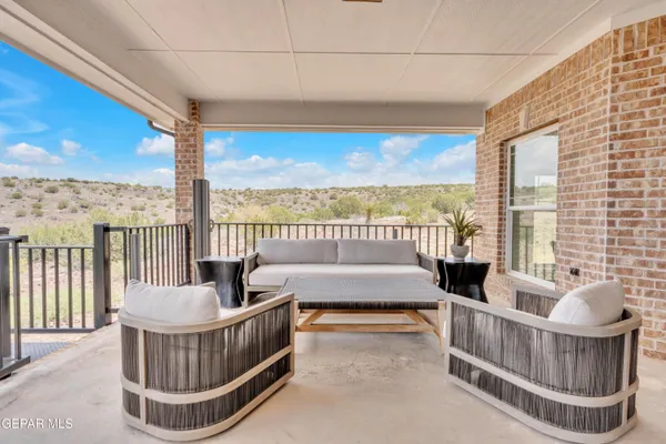 a view of a balcony with couch
