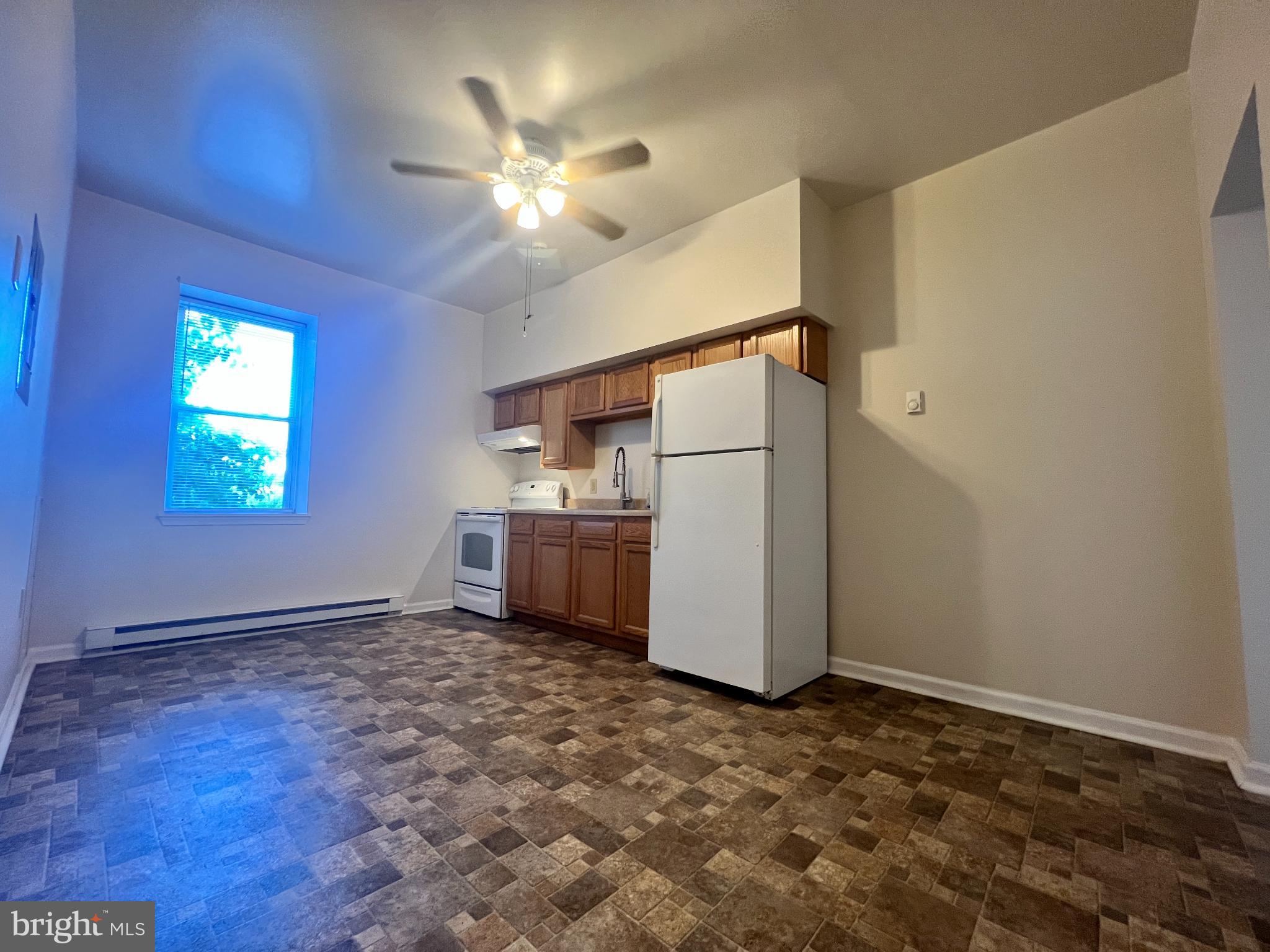 255 South Potomac Street, Unit 2 Hagerstown, MD 21740 - Photo 8 of 18 a view of a storage & utility room with washer and dryer