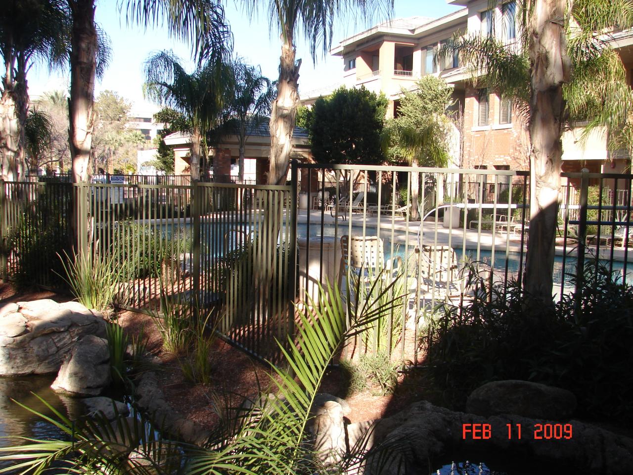 4488 East Thomas Road Phoenix, AZ 85018 - Photo 8 of 8 a view of swimming pool with a patio and lake view