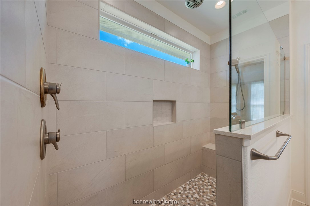 3500 Abingdon Cove Bryan, TX 77808 - Photo 11 of 23 a bathroom with a shower