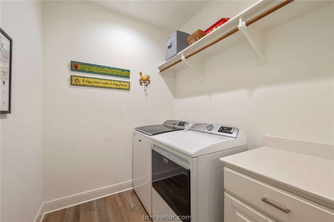 3500 Abingdon Cove Bryan, TX 77808 - Photo 17 of 23 a utility room with dryer and washer