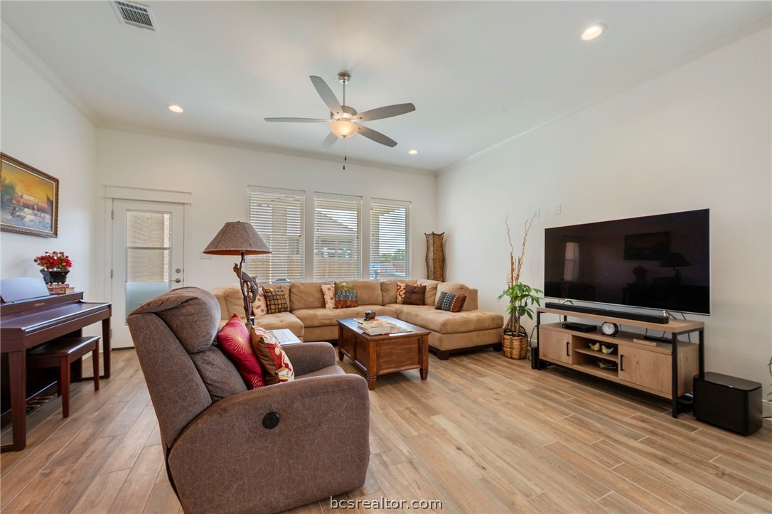 3500 Abingdon Cove Bryan, TX 77808 - Photo 6 of 23 a living room with furniture and a flat screen tv