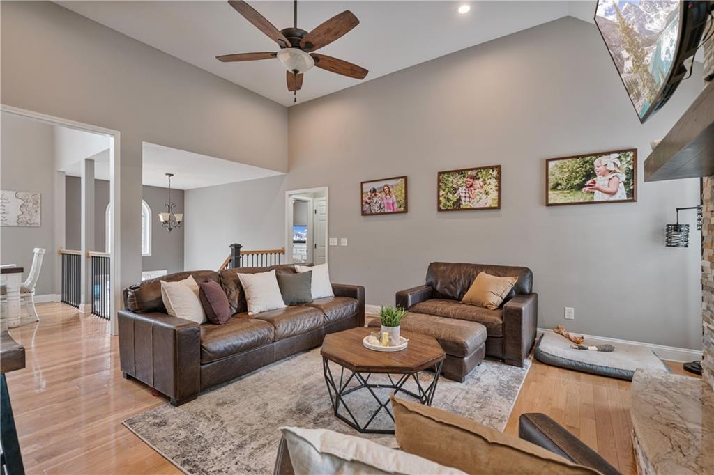 166 Woodford Way Southeast Calhoun, GA 30701 - Photo 11 of 44 a living room with furniture and a couch