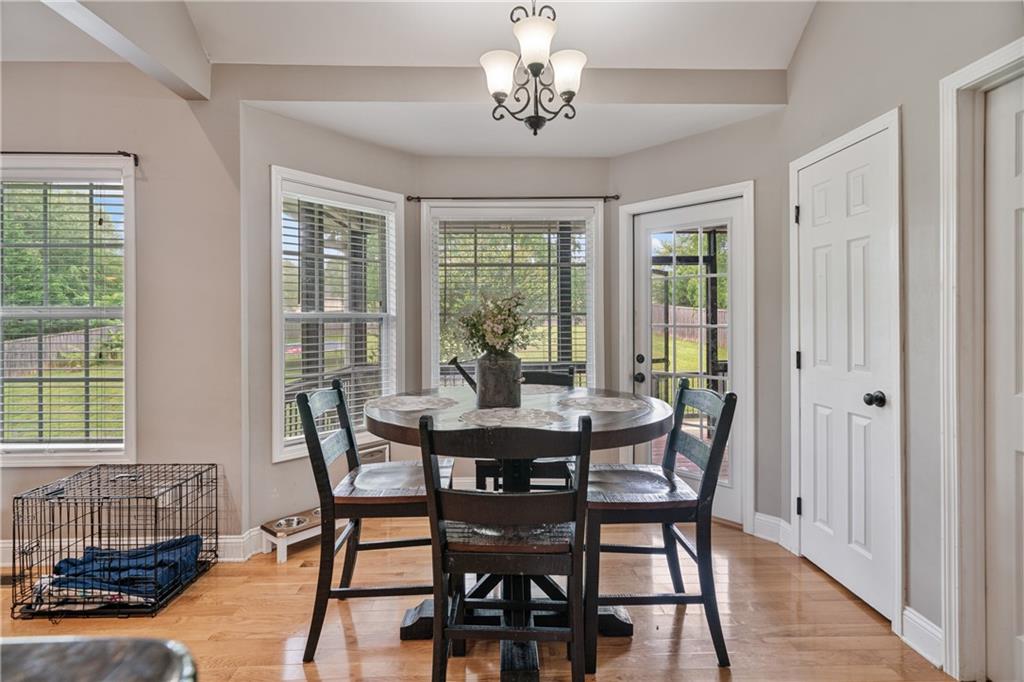 166 Woodford Way Southeast Calhoun, GA 30701 - Photo 18 of 44 a view of a dining room with furniture window and outside view