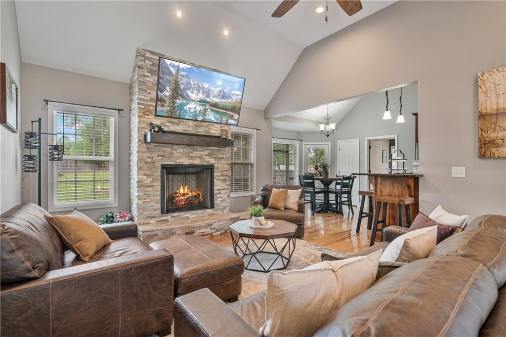 166 Woodford Way Southeast Calhoun, GA 30701 - Photo 3 of 44 a living room with furniture and a fireplace
