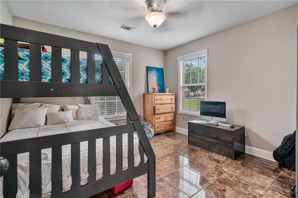 166 Woodford Way Southeast Calhoun, GA 30701 - Photo 32 of 44 a bedroom with furniture and a window