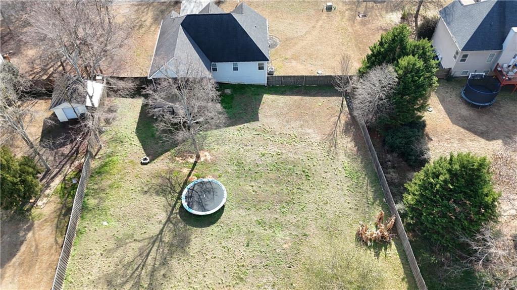 166 Woodford Way Southeast Calhoun, GA 30701 - Photo 42 of 44 a backyard of a house with table and chairs