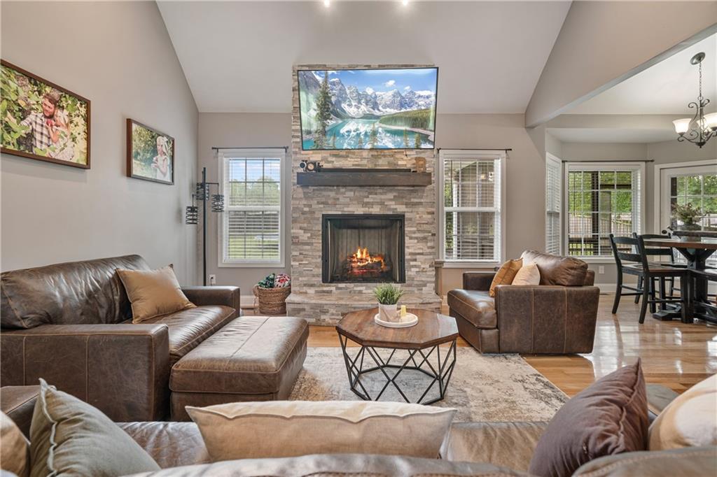 166 Woodford Way Southeast Calhoun, GA 30701 - Photo 9 of 44 a living room with furniture and a fireplace