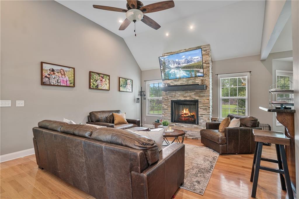166 Woodford Way Southeast Calhoun, GA 30701 - Photo 10 of 44 a living room with furniture and a fireplace