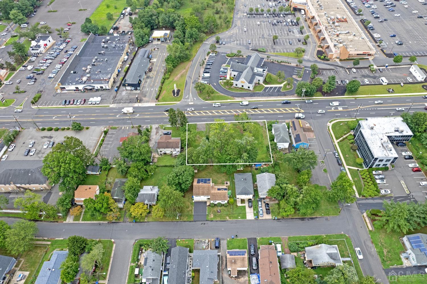 1638-1644 Oak Tree Road Edison, NJ 08820 - Photo 3 of 15 an aerial view of multiple houses with outdoor space