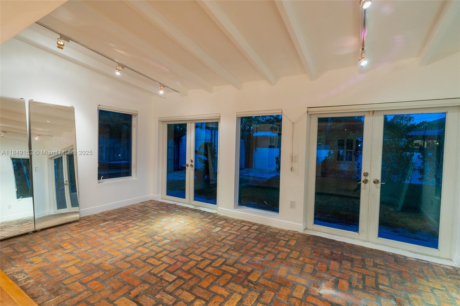 355 Redwood Lane Key Biscayne, FL 33149 - Photo 16 of 34 a view of an empty room