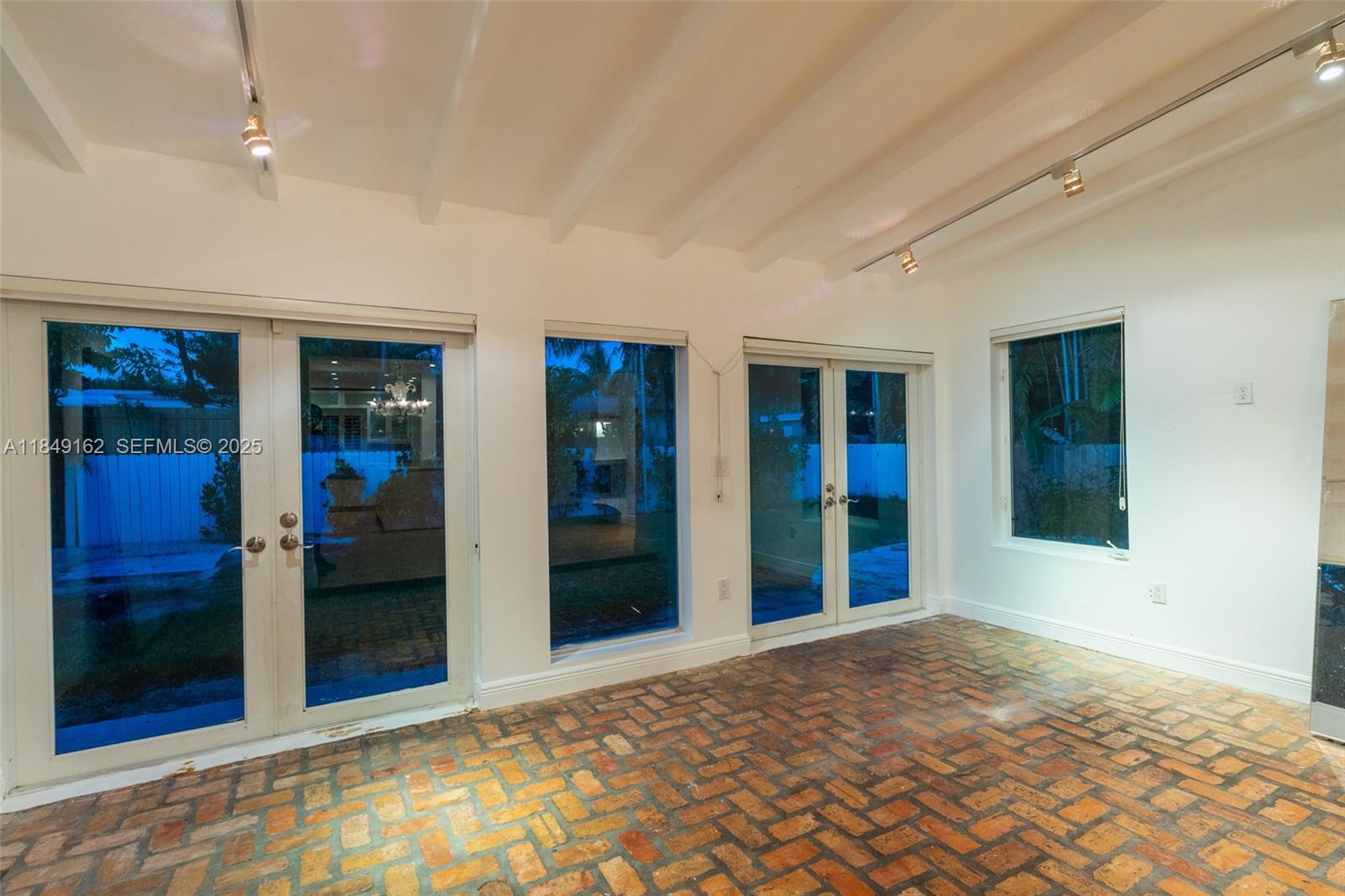 355 Redwood Lane Key Biscayne, FL 33149 - Photo 17 of 34 a view of an empty room