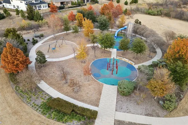 an aerial view of a house with outdoor space