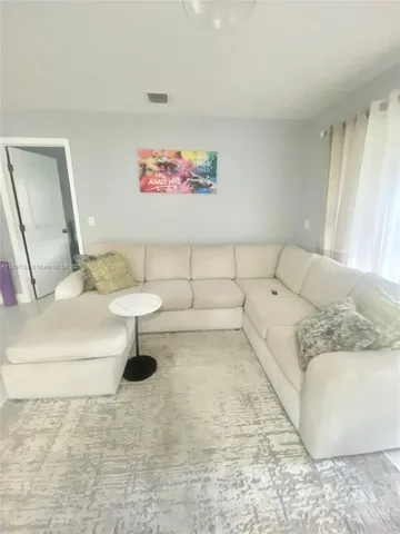 a bathroom with a sink toilet and vanity