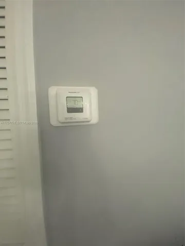 a table with a stove and a microwave