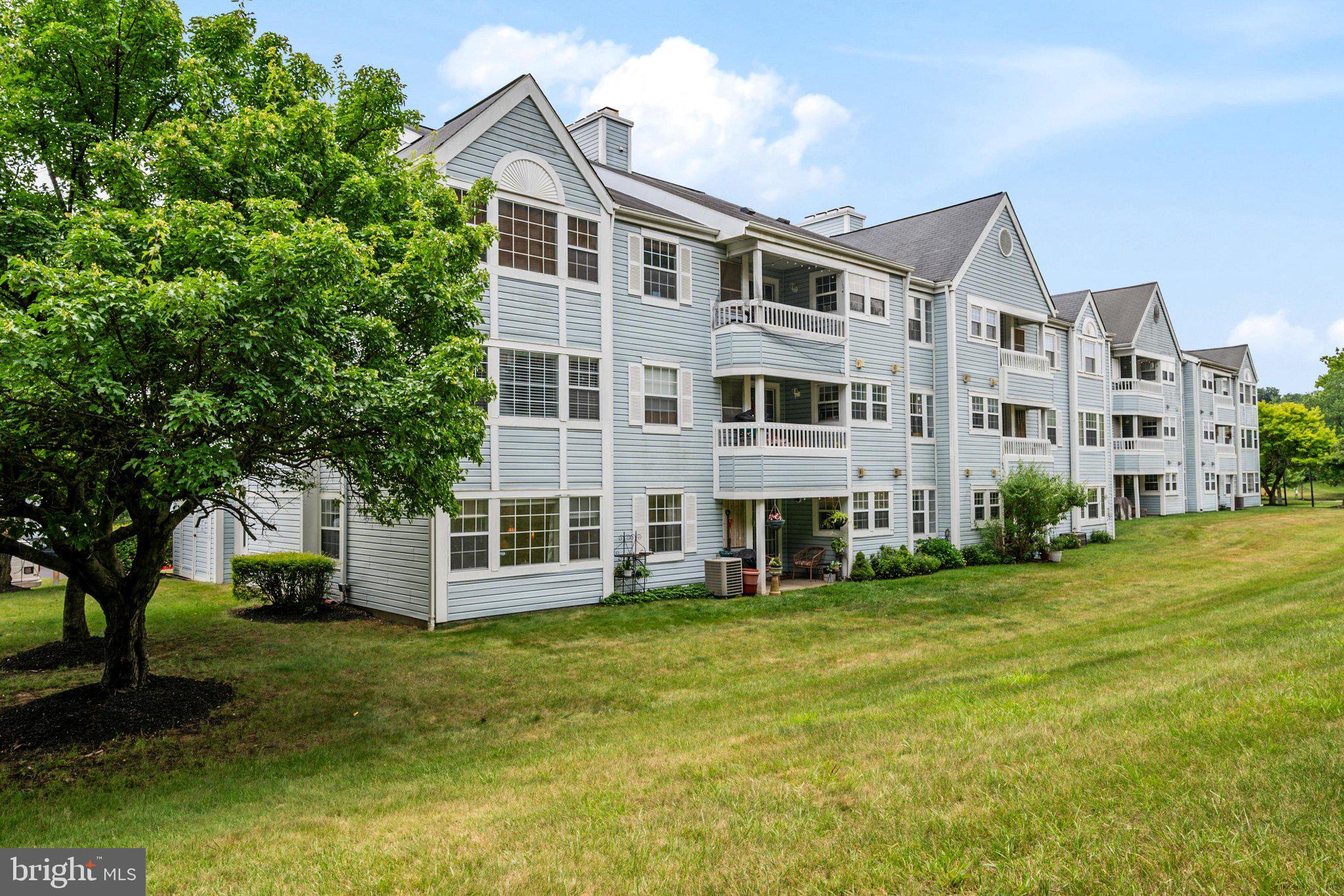8337 Montgomery Run Road, Unit C Ellicott City, MD 21043 - Photo 21 of 24 Rear view of home overlooking green space