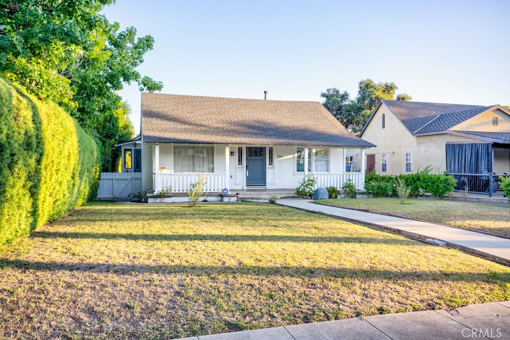 a view of swimming pool with a lounge chairs