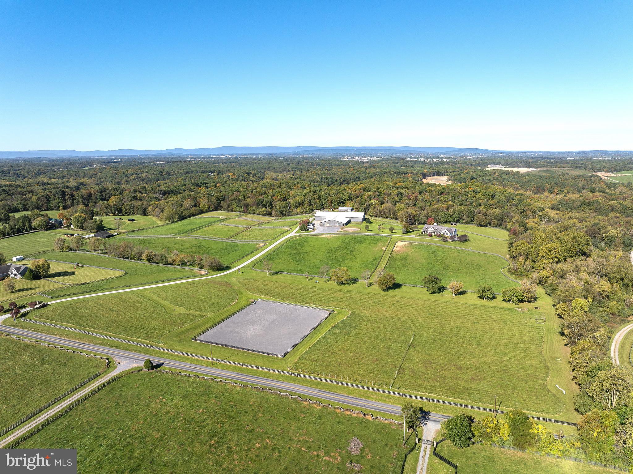 749 Salem Church Road Boyce, VA 22620 - Photo 13 of 53 outdoor riding arena in front of home and barn