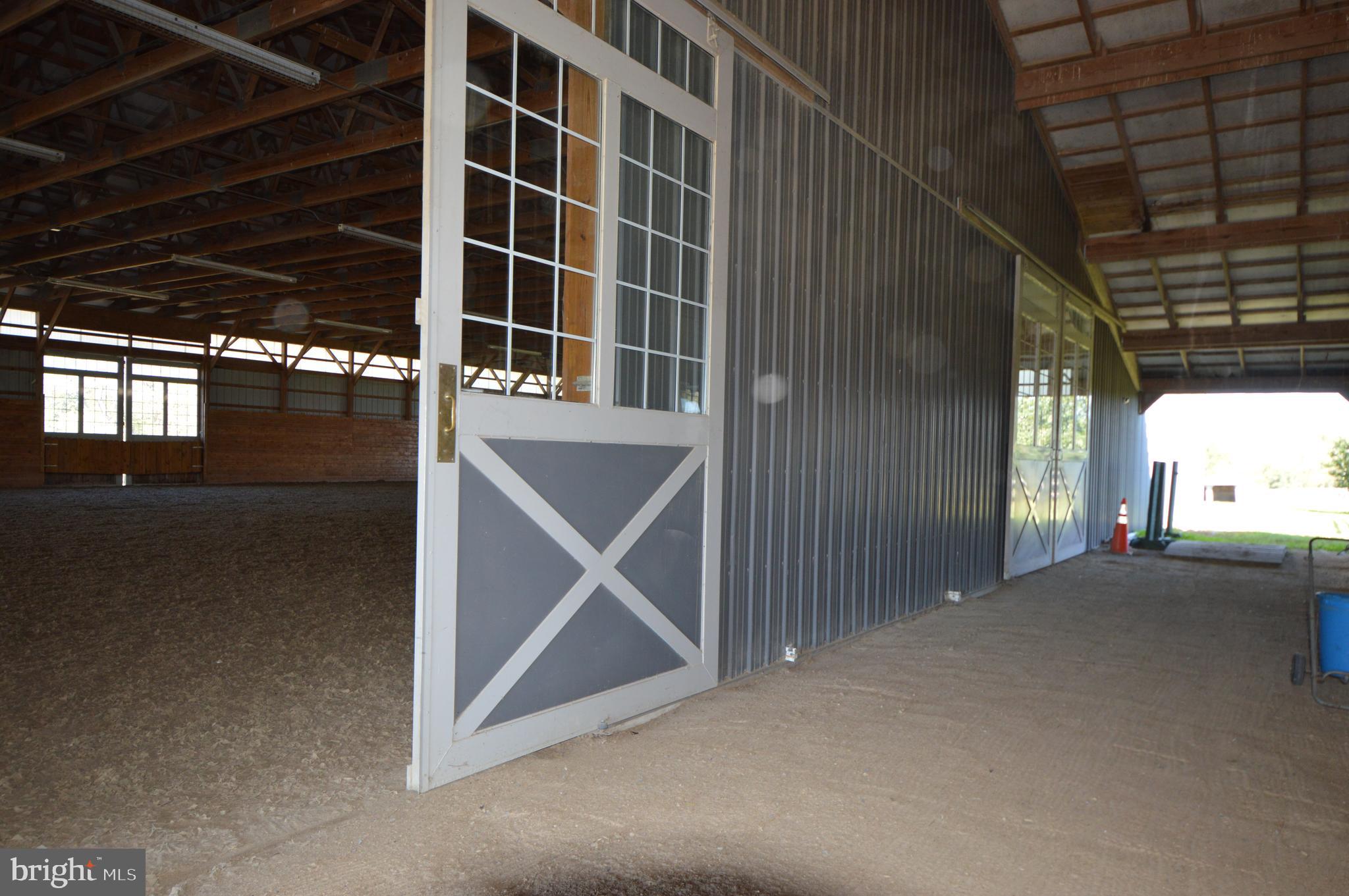 749 Salem Church Road Boyce, VA 22620 - Photo 21 of 53 Breezeway between the barn and indoor arena