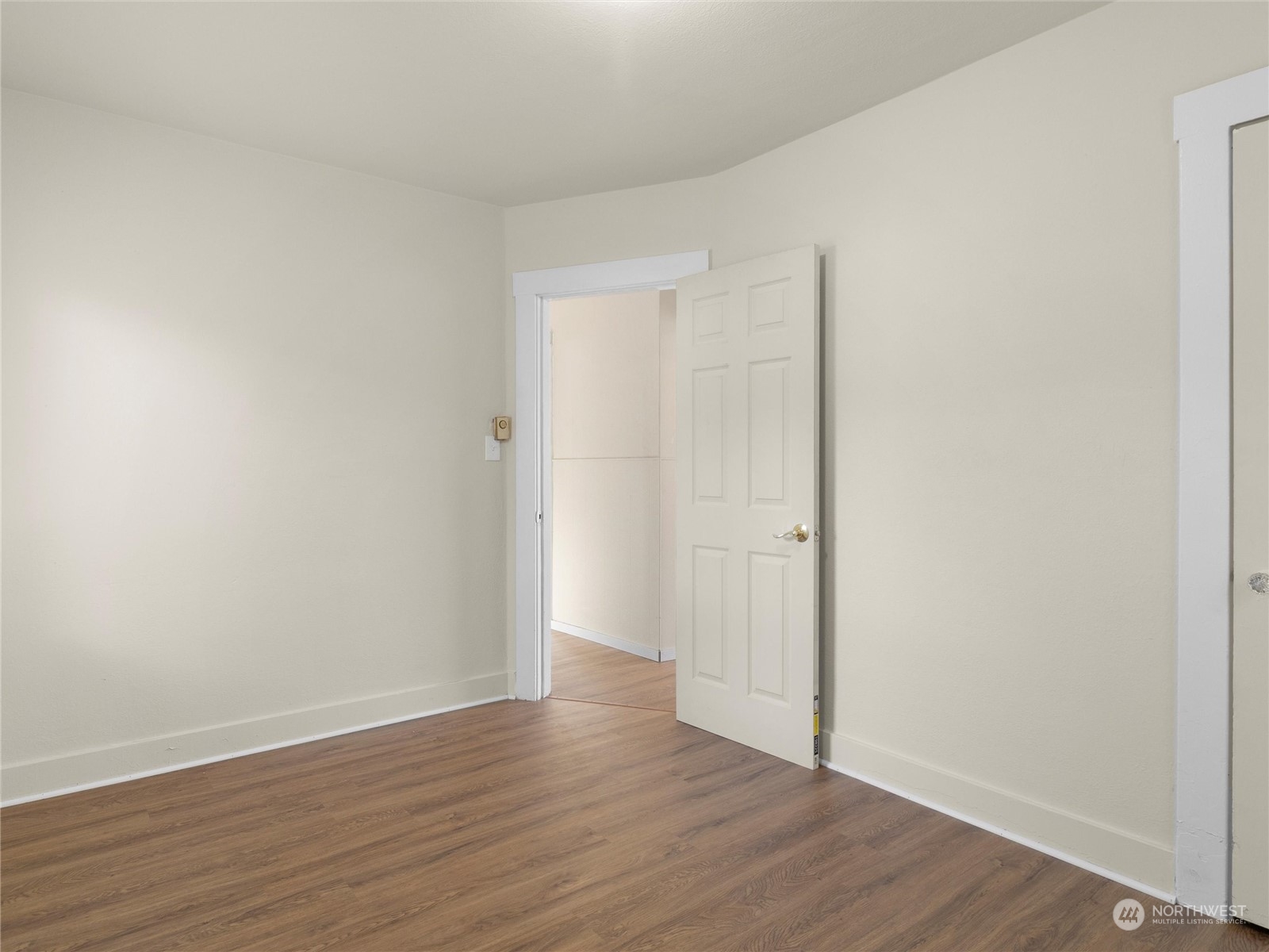 2304 Sumner Avenue Aberdeen, WA 98520 - Photo 19 of 31 a view of an empty room with wooden floor