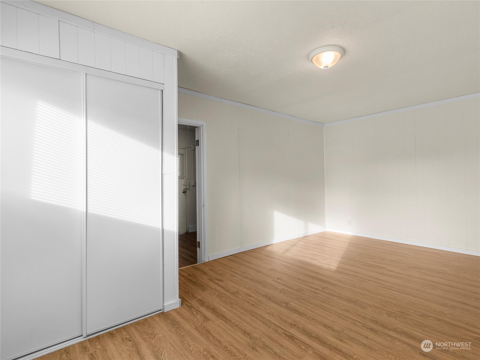 2304 Sumner Avenue Aberdeen, WA 98520 - Photo 25 of 31 an empty room with wooden floor and closet