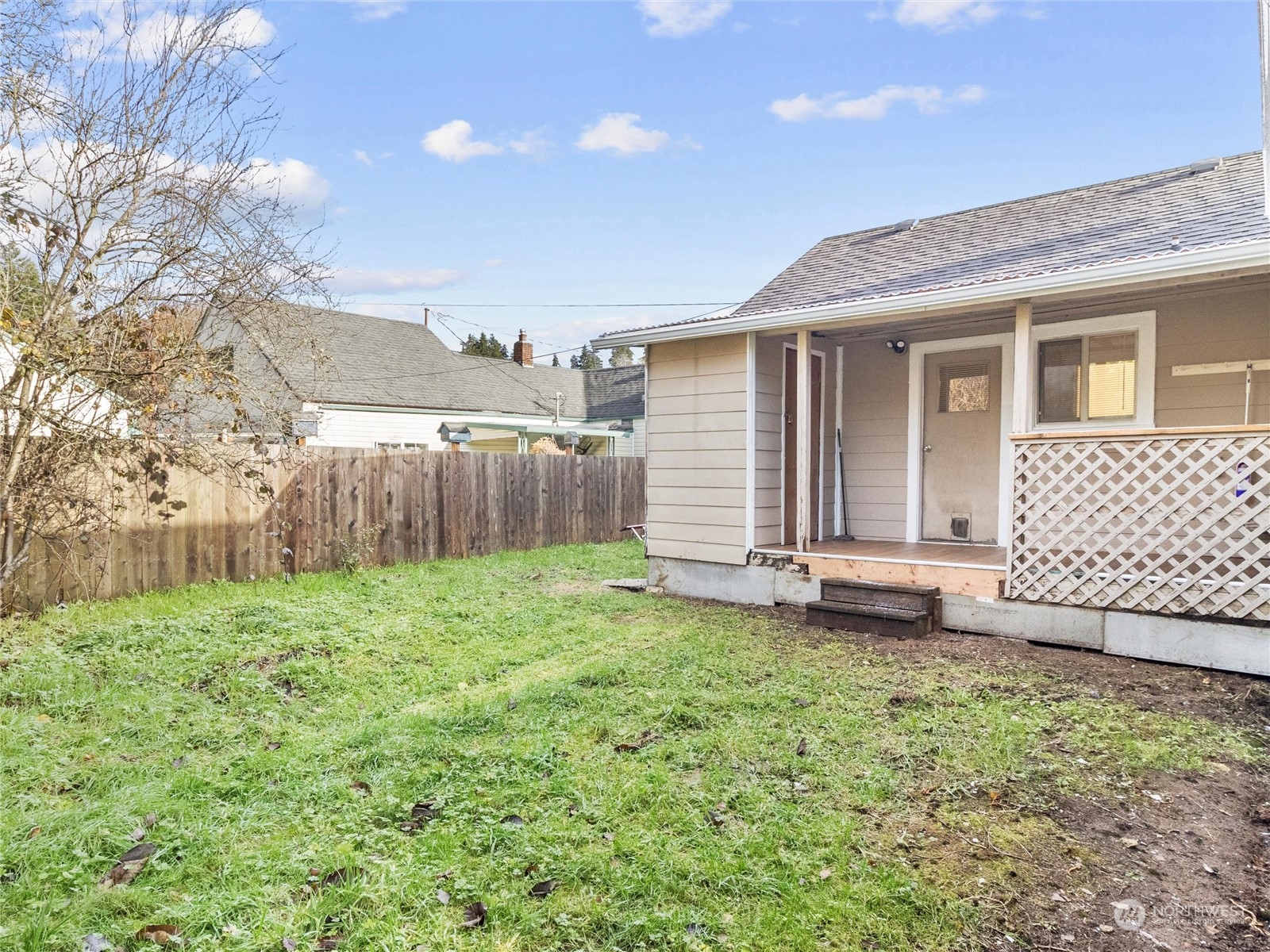 2304 Sumner Avenue Aberdeen, WA 98520 - Photo 27 of 31 a view of a house with backyard and wooden fence
