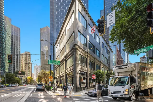 a view of a building with sitting area