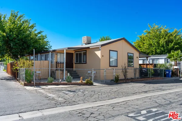 a view of a house with a patio
