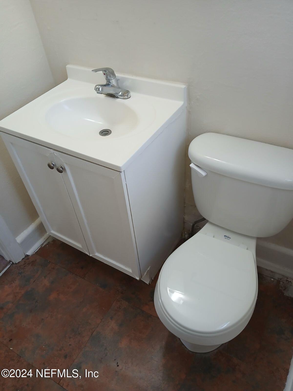 2414 Rogero Road Jacksonville, FL 32211 - Photo 13 of 13 bath toilet pic