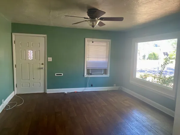 a view of an empty room with a window